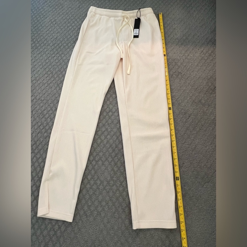 Nova Men's Show Up Slim Slit Cream colored full pleated Pants NWT